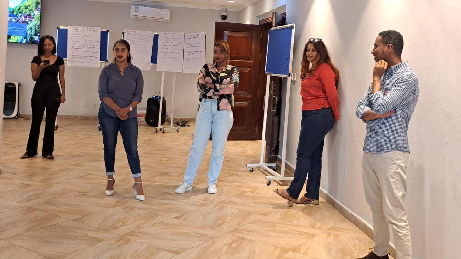 Group standing in a room